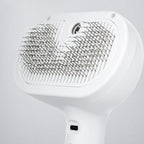 Rounded stainless-steel pin detail of pet grooming brush