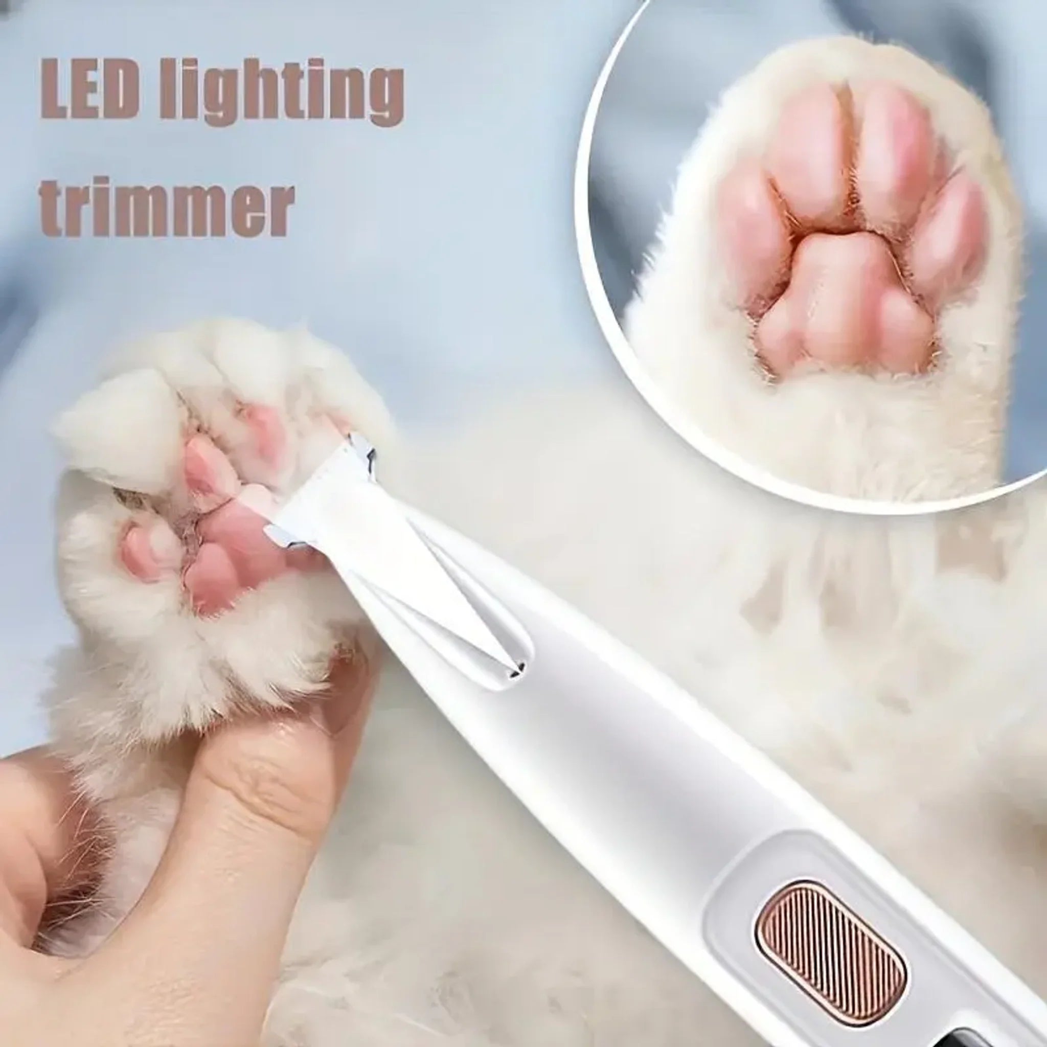 White LED pet paw trimmer used near a dog's paw