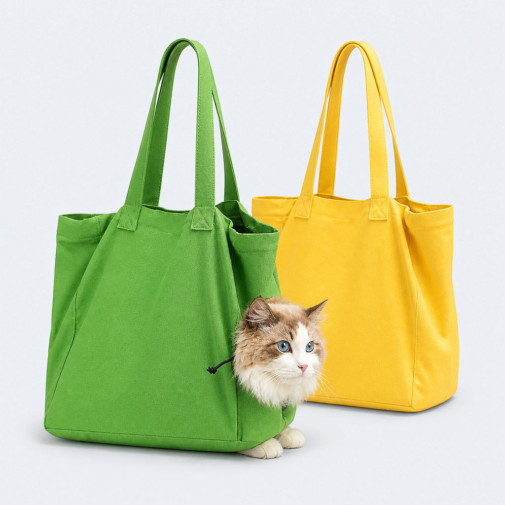 Green and yellow portable cat carrier bags with a cat on a cool gray-blue background