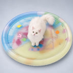 Water-filled sensory play mat with a white cat on a cool gray-blue background
