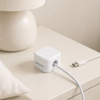 Open off-white cable organizer clip, close-up