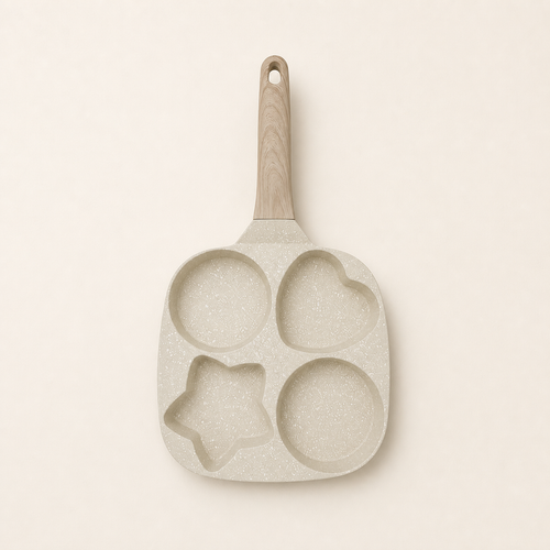 Cream four-well breakfast pan with round, heart, and star-shaped wells